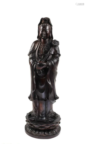 A Carved Hardwood (Possibly Zitan) Guanyin Statue