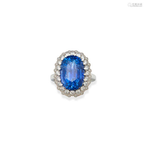 A SAPPHIRE AND DIAMOND RING