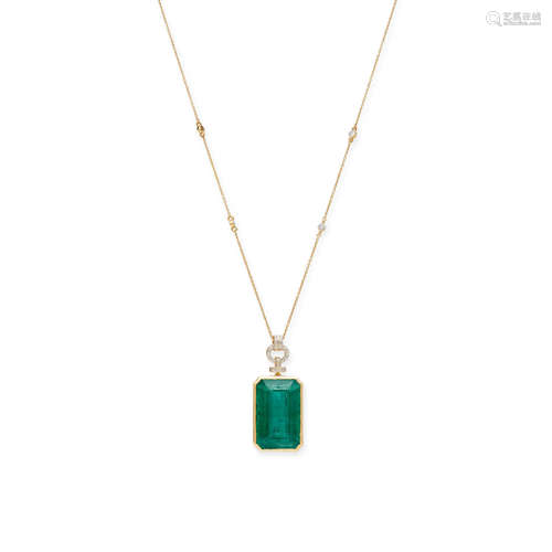 AN EMERALD AND DIAMOND PENDANT