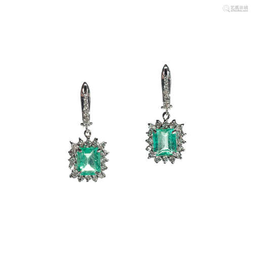 A PAIR OF EMERALD AND DIAMOND EARRINGS