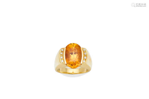A TOPAZ AND DIAMOND RING