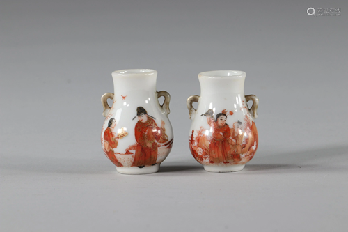 Pair of iron red porcelain vases with character