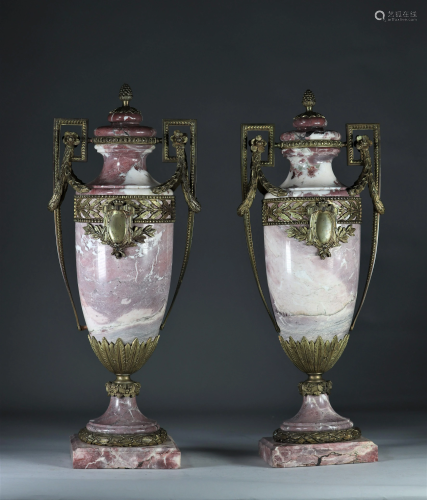 Imposing pair of white veined pink marble cassolettes