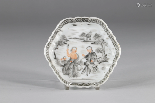 Rare grisaille porcelain spoon rest of an erotic scene.