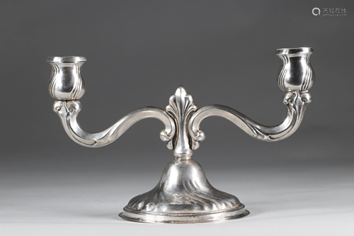 Silver candlestick with hallmarks to identify