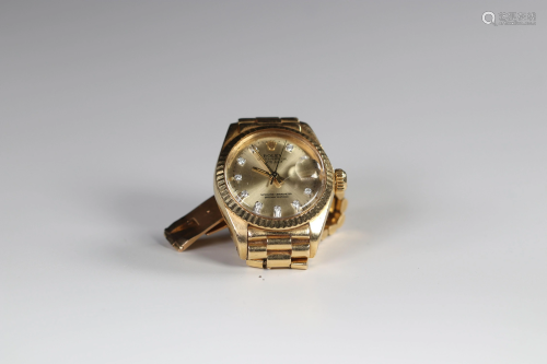 ROLEX ladies' watch in gold. diamond indexes. 26mm