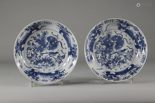 China pair of blanc bleu porcelain strawberry skimmers