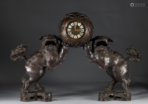 Imposing Chinese bronze clock adorned with FÃ´ dogs