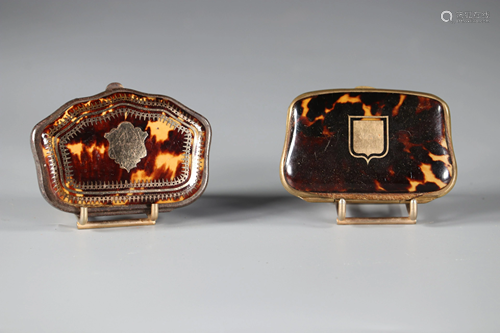 Lot of two tortoiseshell coin purses and gold inlays.