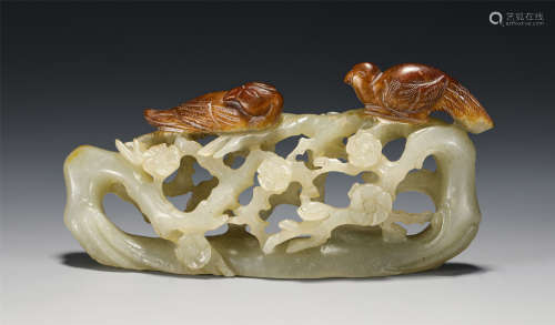 A CHINESE CARVED BIRD AND FLOWER JADE DECORATION