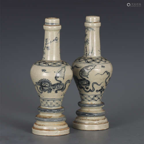 A PAIR OF CHINESE BLUE AND WHITE PORCELAIN STEM VASES