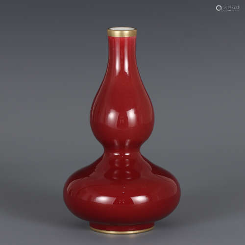 A CHINESE RED GLAZED PORCELAIN DOUBLE-GOURD VASE