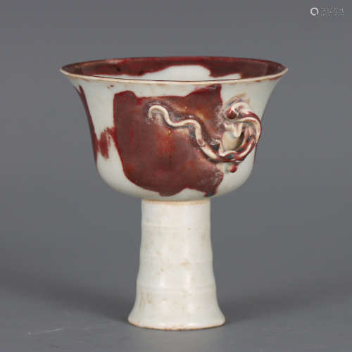 A CHINESE RED UNDERGLAZED PORCELAIN STEM CUP