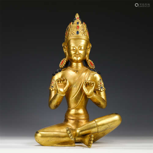 A CHINESE GILT BRONZE FIGURE OF BUDDHA