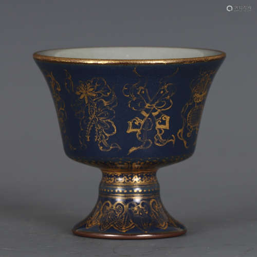 A CHINESE BLUE GLAZED PORCELAIN STEM CUP