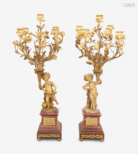 A pair of Louis XVI-style gilt-bronze and marble