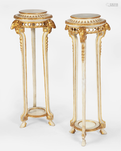 A pair of Regency-style carved giltwood plant stands