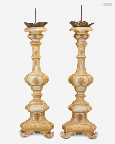 A pair of Italian giltwood pricket candlesticks