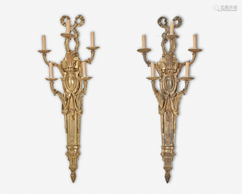 A pair of French Louis XVI-style gilt-bronze sconces