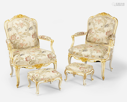 A pair of Louis XVI-style carved giltwood fauteuils