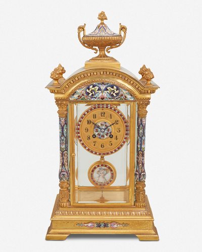 A French gilt-bronze and champleve mantel clock