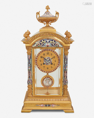 A French gilt-bronze and champleve mantel clock