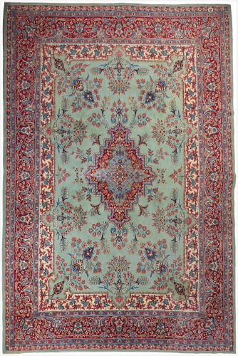 A Persian Kerman area rug