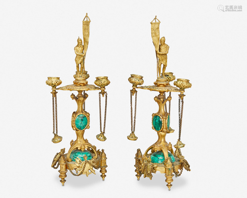 A pair of gilt-bronze and malachite candlesticks