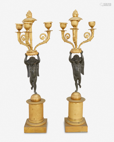 A pair of French Empire-style bronze figural candelabra