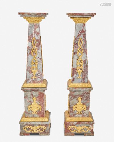 A pair of gilt-bronze and marble pedestals