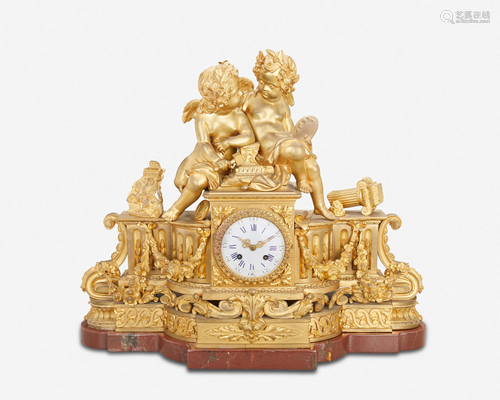 A French Louis XVI-style gilt-bronze and marble mantel