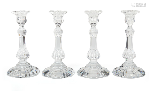 A set of four Baccarat crystal candlesticks