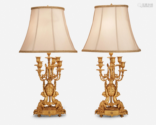 A pair of Louis XVI-style gilt-bronze table lamps