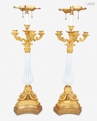 A pair of French gilt-bronze and opaline glass candle