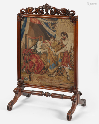 An English fire screen with figural petit point
