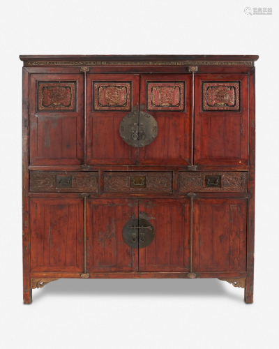 A Chinese carved wood cabinet