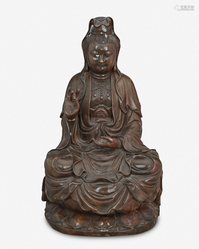 A patinated bronze Buddha