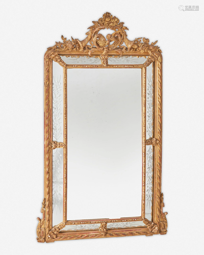 An Italian carved giltwood wall mirror