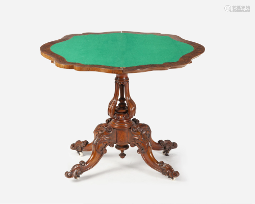 An English Rococo-style flip-top game table