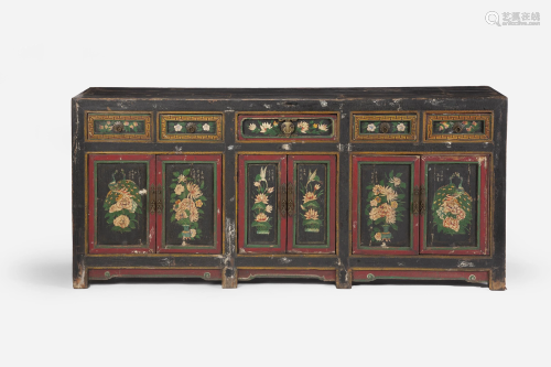 A Chinese carved and polychromed wood credenza