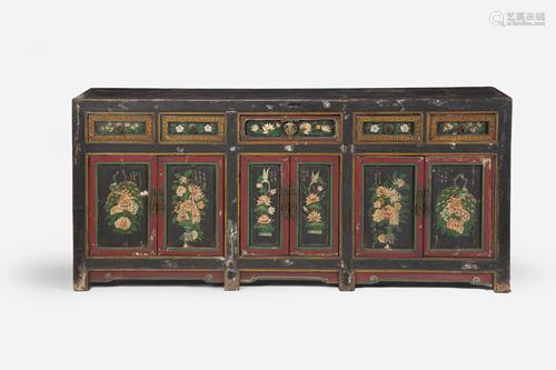 A Chinese carved and polychromed wood credenza