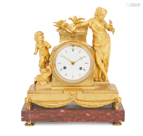 A French gilt-bronze figural mantle clock