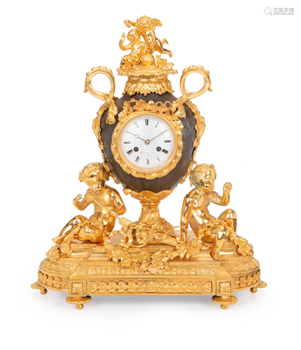 A Guyerdet Aine gilt-bronze clock