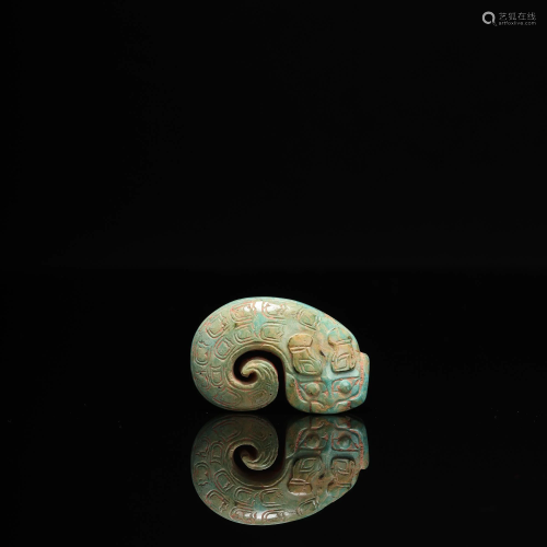 A Carved Turquoise Dragon Pendant