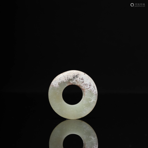 A Carved Russet Jade Disc