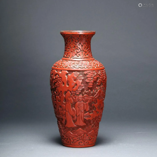 A Carved Red Lacquer Figural Vase