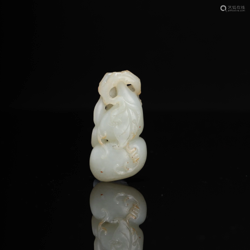 A Carved Jade Double Gourd Pendant