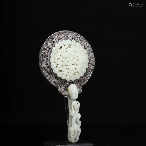 A Carved Jade Mirror with Belt Buckle Handle