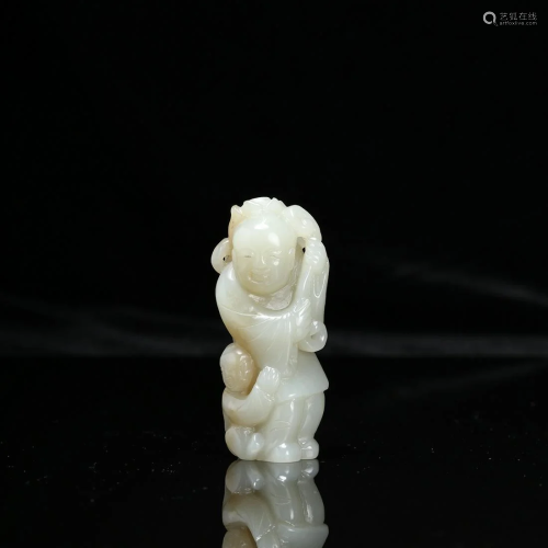 A Carved Jade Child Figure