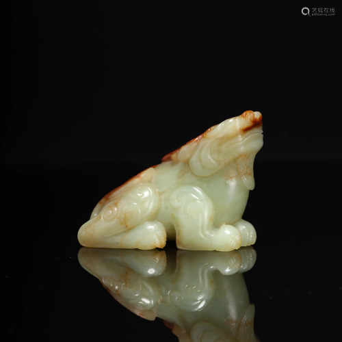 A Carved Russet Jade Beast Figure